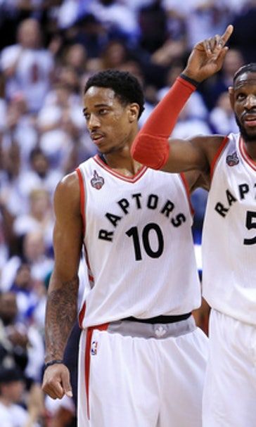 Carroll scores 21, Raptors beat Heat in OT to tie series